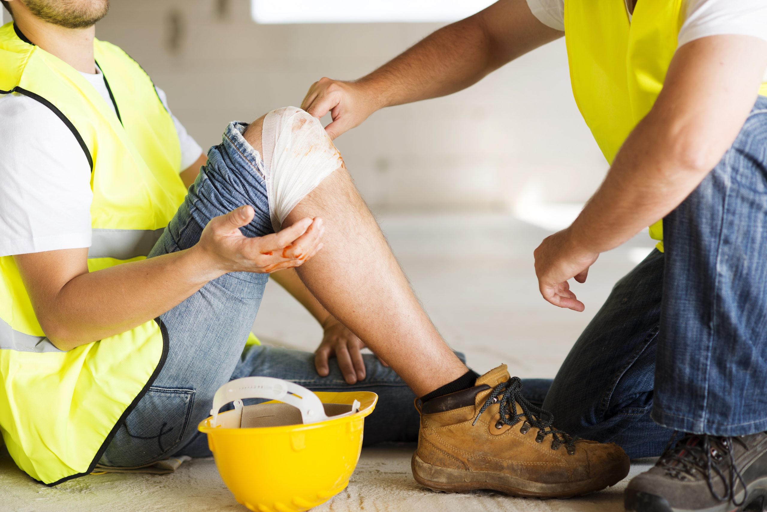 worker with a knee bandage 
