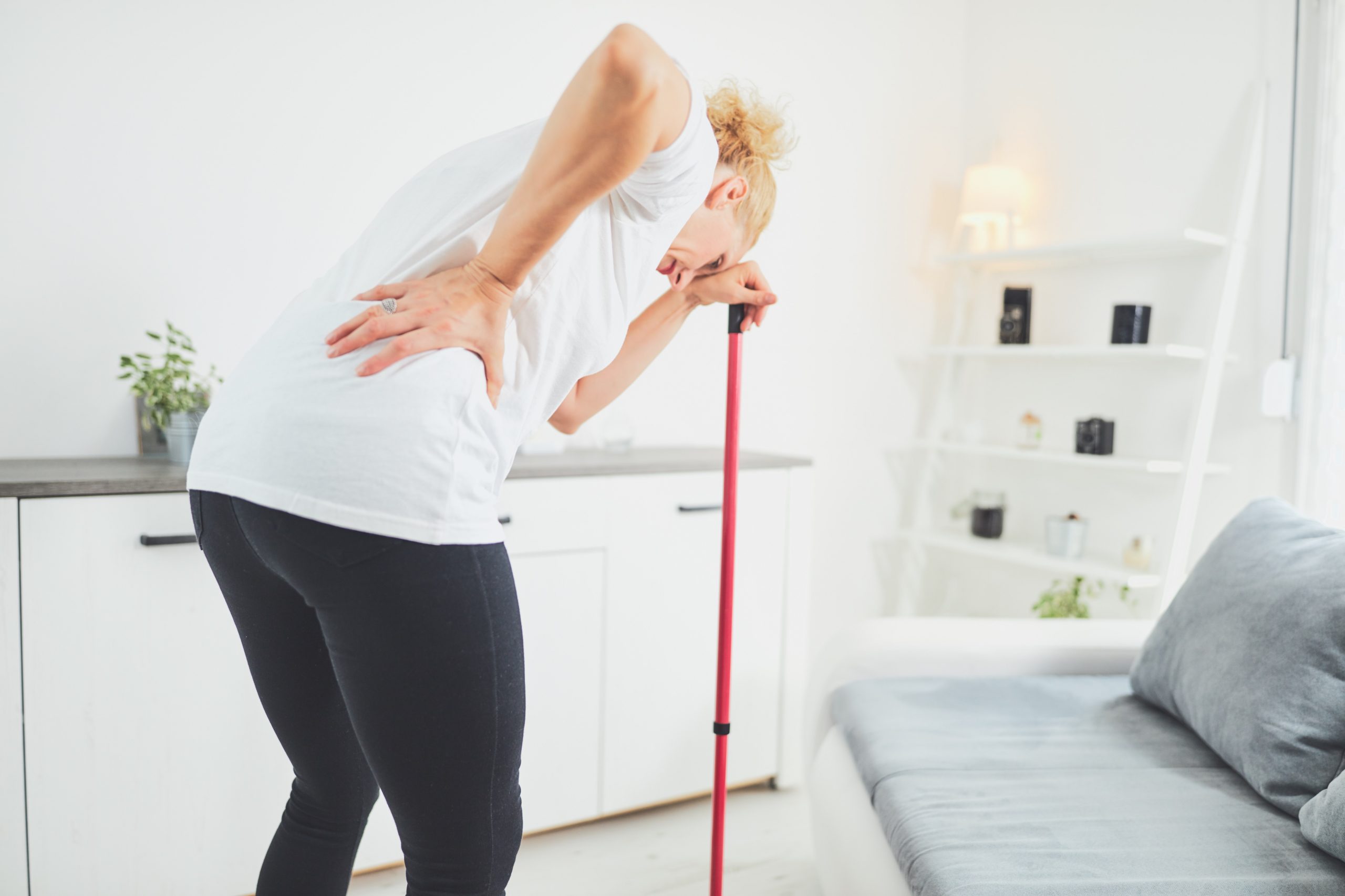 housekeeper holding her back