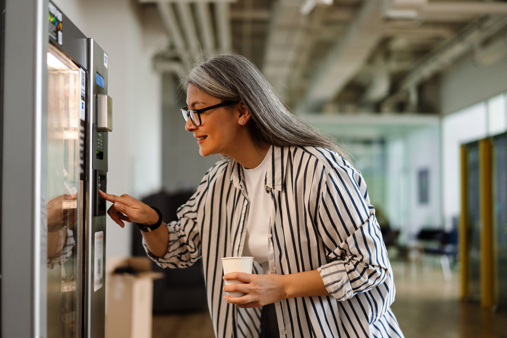 How Effective Breaks at Work Increase Productivity 2 older woman using vending machine